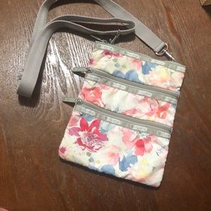 LeSportsac crossbody. Durable fabric, easy to clean. Stain, tear, fade free.